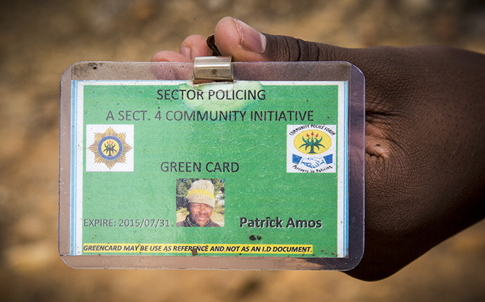 Patrick Amos's green card which he says he is being made to carry like the 'dompas' system. Picture: Thomas Holder/EWN.