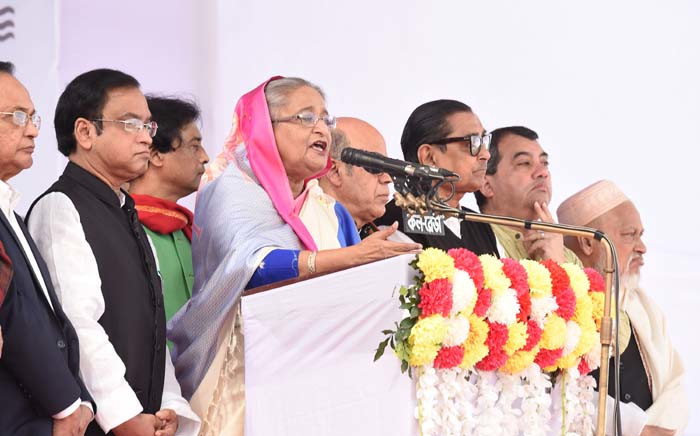Bangladesh Prime Minister Sheikh Hasina (C) speaks during an election campaign rally in Dhaka on 24 December 2018. Prime Minister Sheikh Hasina heads to the polls in Bangladesh this week on course for a historic victory, while her ailing opponent faces an uncertain future in a colonial-era Dhaka jail. Picture: AFP