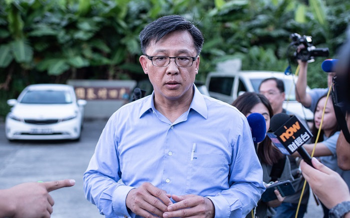 FILE: This picture taken on 23 July 2019 shows Hong Kong pro-Beijing government lawmaker Junius Ho leaving the cemetery after learning his parents' gravestones were vandalised in the Tuen Mun district of Hong Kong. Picture: AFP