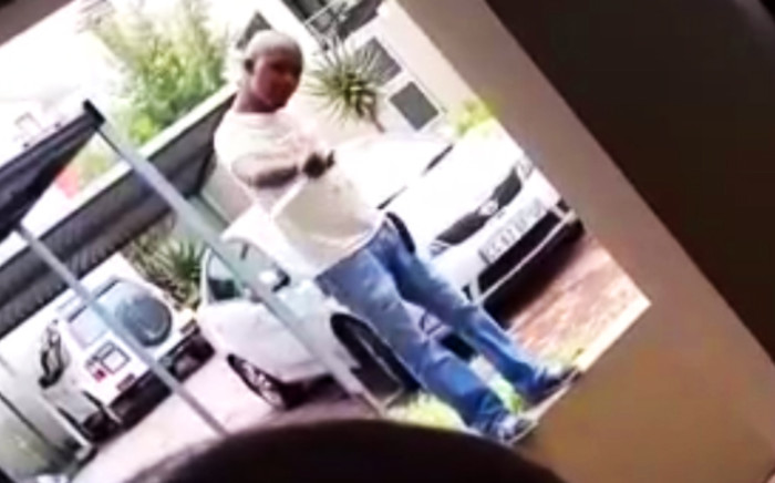 A screenshot from a video where a man threatens a Sandton couple with a knife. Picture: Supplied.