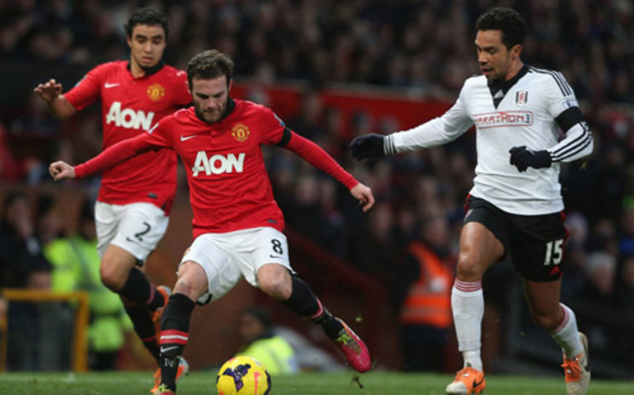 Manchester United's Juan Mata passes the ball during the English Premier League match against Fulham on 9 February 2014. Picture: Facebook.