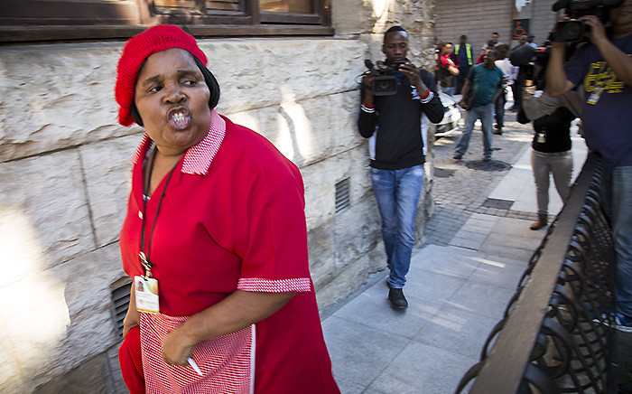 FILE: The EFF's Makoti Khawula retaliates against Parliamentary staff who clashed with MPs outside the National Assembly after the party's members were ejected on 4 May 2016. Picture: Aletta Harrison/EWN.