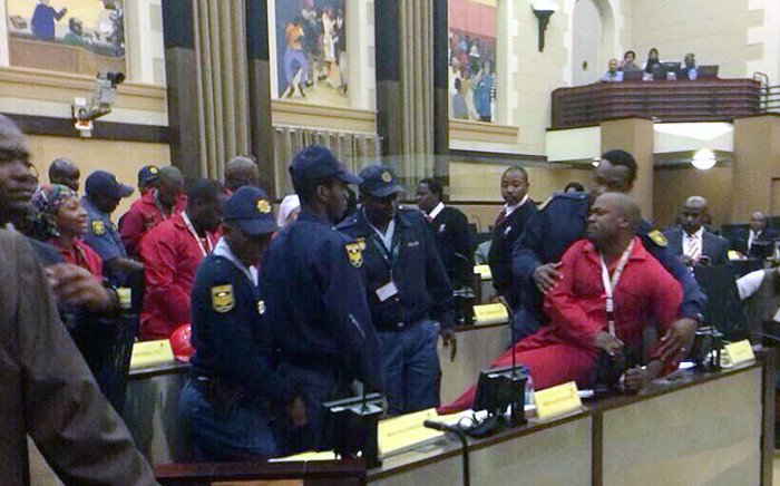 Economic Freedom Fighters (EFF) members were kicked out of the Gauteng Legislature for wearing inappropriate clothing on 1 July 2014. Picture: Cameron Modisane.