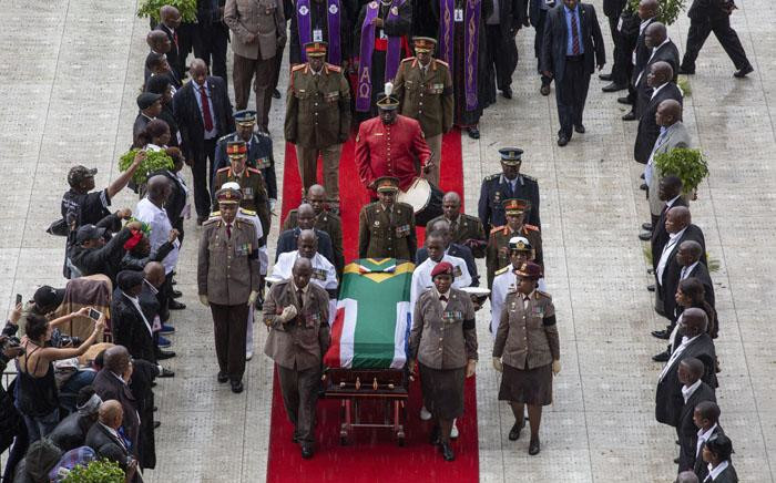 The coffin carrying the body of the late anti-apartheid activist Winnie Madikizela-Mandela leaves Orlando Stadium in Soweto. The late struggle icon will be laid to rest at Fourways Memorial Park next to her great-grandchildren. Picture: Ihsaan Haffejee/EWN.