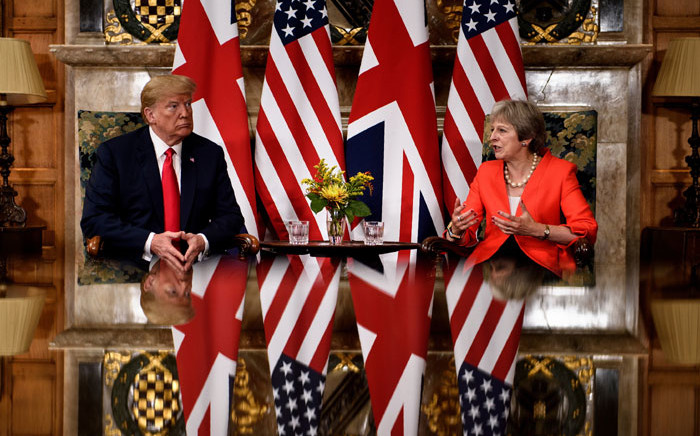 US President Donald Trump listens to Britain's Prime Minister Theresa May prior to a meeting at Chequers, the prime minister's country residence, near Ellesborough, northwest of London on 13 July 2018. Picture: AFP