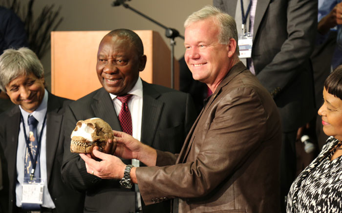 Paleoanthropologist Professor Lee Berger and Deputy President Cyril Ramaphosa hold a replica of one of the Homo naledi fossils at the Cradle of Humankind, 10 September 2015. Picture: Christa Eyber/EWN."