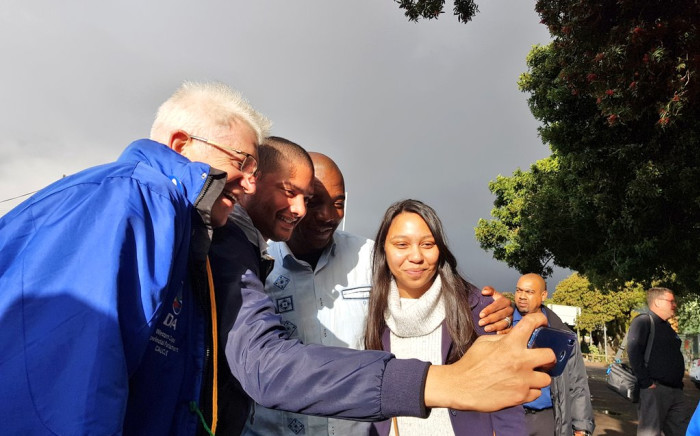 Western Cape Premier candidate Alan Winde and DA leader Mmusi Maimane pose with voters in the Cape. Picture: @Our_DA/Twitter