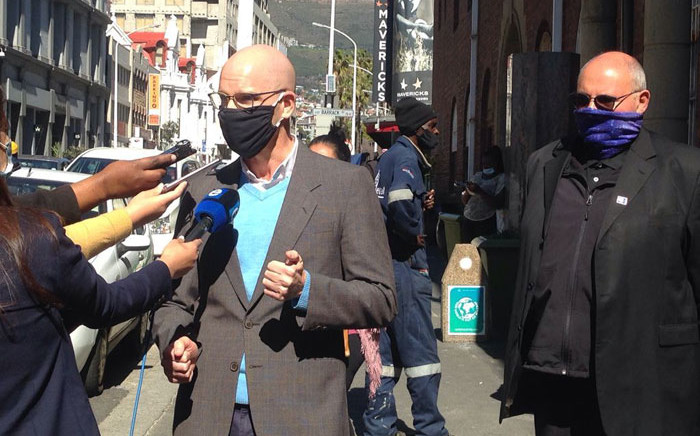 The DA's Michael Cardo (left) speaks to the media after laying a criminal complaint at the Cape Town Central Police Station on 7 September 2021 against the ANC's top six over the ruling party’s alleged failure to pay UIF contributions for employees. Picture: @Our_DA/Twitter