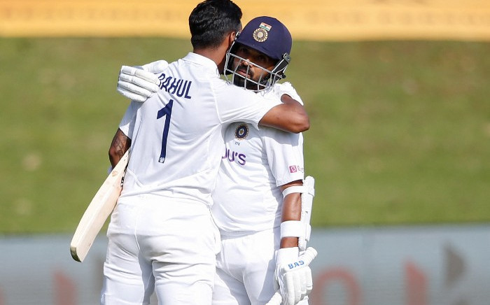 India's KL Rahul (L) celebrates with India's Ajinkya Rahane (R) after scoring a century (100 runs) during the first day of the first Test cricket match between South Africa and India at SuperSport Park in Centurion on December 26, 2021. Picture: AFP