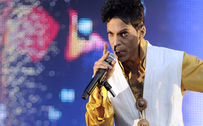 FILE. This June 30, 2011 file photo shows US singer and musician Prince performing on stage at the Stade de France in Saint-Denis, outside Paris. Picture: AFP.
