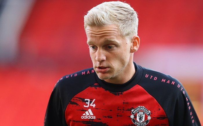 Manchester United's Dutch midfielder Donny van de Beek warms up for the English Premier League football match between Manchester United and Crystal Palace at Old Trafford in Manchester, north west England, on 19 September 2020. Picture: AFP. 
