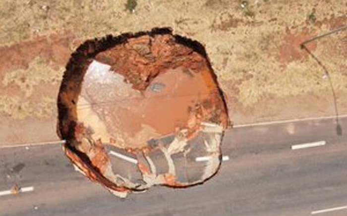 A four-meter-deep sinkhole on Snake Road near the N12 is being investigated. Picture: Jacob Mamabolo/Twitter
