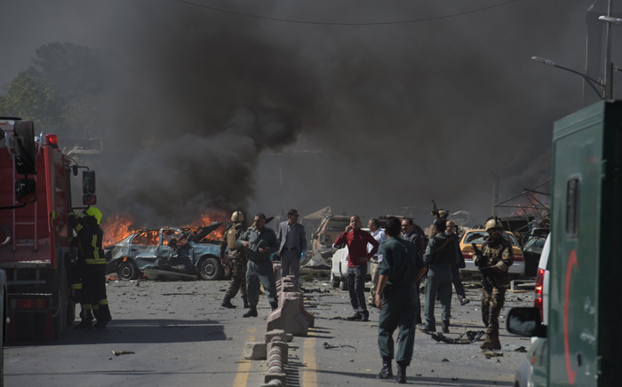 Afghan security forces arrive at the site of a car bomb attack in Kabul on 31 May 2017. Picture: AFP.