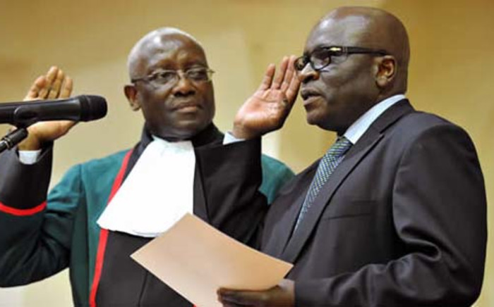Minister of Mineral Resources Ngoako Ramatlhodi (R) is seen being sworn in as a deputy minister in 2010. Picture: GCIS.