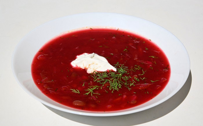 An illustration photo taken on July 1, 2022, shows plate of beetroot borscht soup with sour cream in Moscow. Picture: Natalia Kolesnikova / AFP

