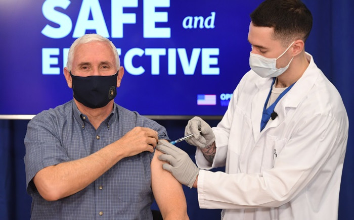 US Vice President Mike Pence receives the COVID-19 vaccine in the Eisenhower Executive Office Building in Washington, DC, on 18 December 2020. Picture: AFP.
