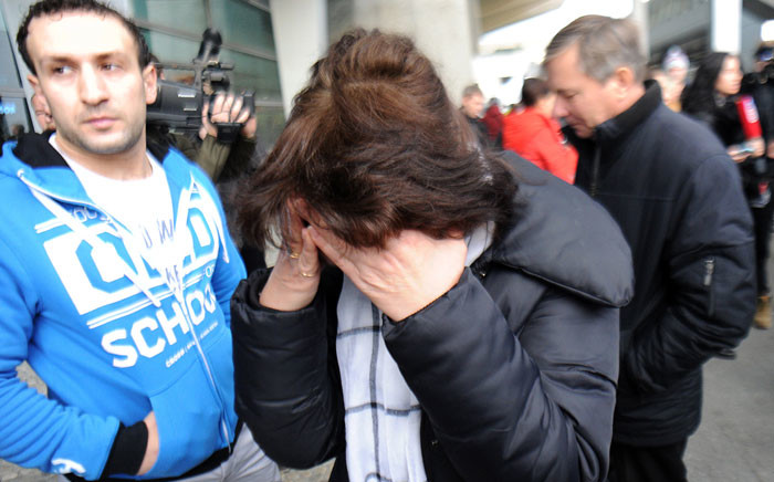 Relatives react at Pulkovo international airport outside Saint Petersburg after a Russian plane with 224 people on board crashed in a mountainous part of Egypt's Sinai Peninsula on 31 October, 2015. Picture: AFP.
