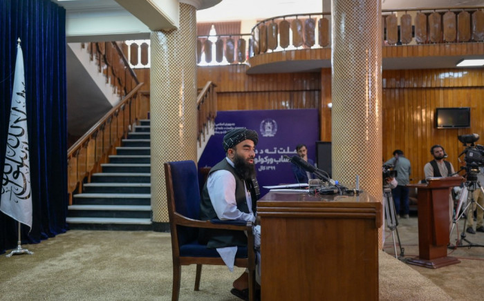 Zabihullah Mujahid, Chief spokesperso for the Taliban, speaks during a press conference with the members of the media in Kabul on September 21, 2021.