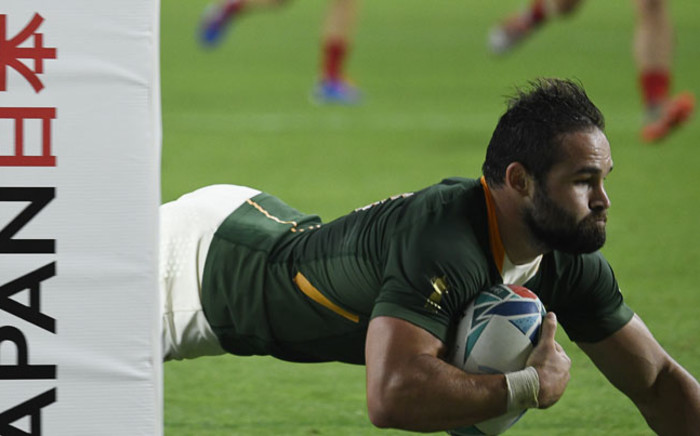 South Africa's scrum-half Cobus Reinach scores a try during the Japan 2019 Rugby World Cup Pool B match between South Africa and Canada at the Kobe Misaki Stadium in Kobe on 8 October 2019. Picture: AFP