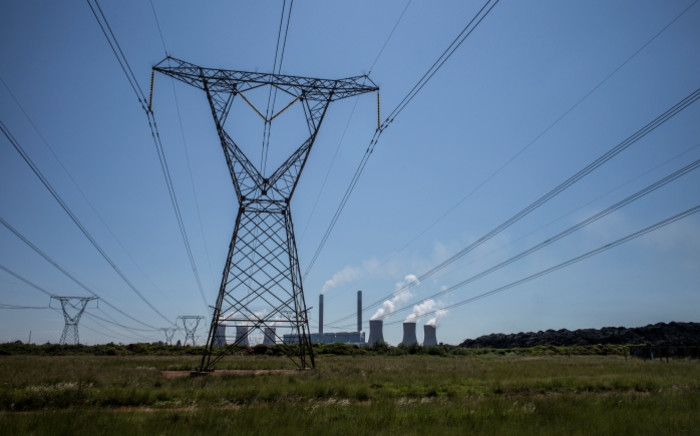 FILE: Power lines leaving Eskom's Duvha power station, 15km east of Witbank. Picture: AFP