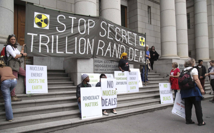 Protesters gathered outside of the Western Cape High Court where it was ruled that government's decision to call for proposals for the procurement of 9.6 gigawatts of nuclear energy is unlawful and unconstitutional. Picture: Cindy Archillies/EWN.