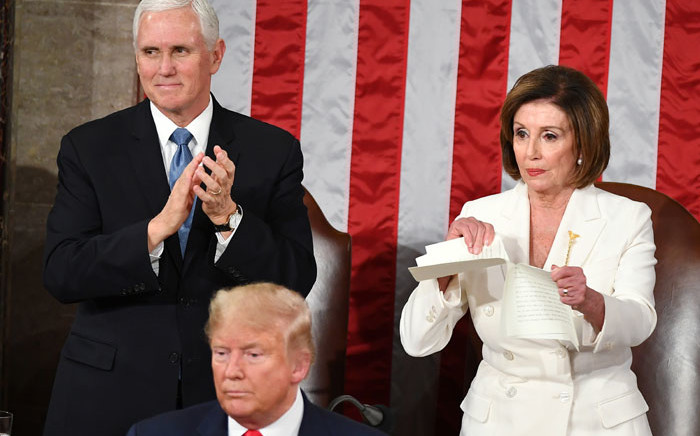 Speaker of the US House of Representatives Nancy Pelosi rips a copy of US President Donald Trump's speech after he delivered the State of the Union address at the US Capitol in Washington, DC, on 4 February 2020. Picture: AFP