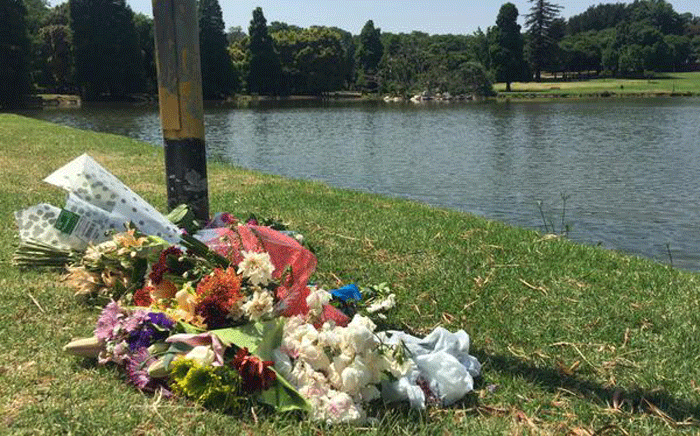 FILE: Flowers laid at the scene where two couples were brutally attacked by a gang of men at Rhodes Park in Kensington. Picture: Govan Whittles/EWN.