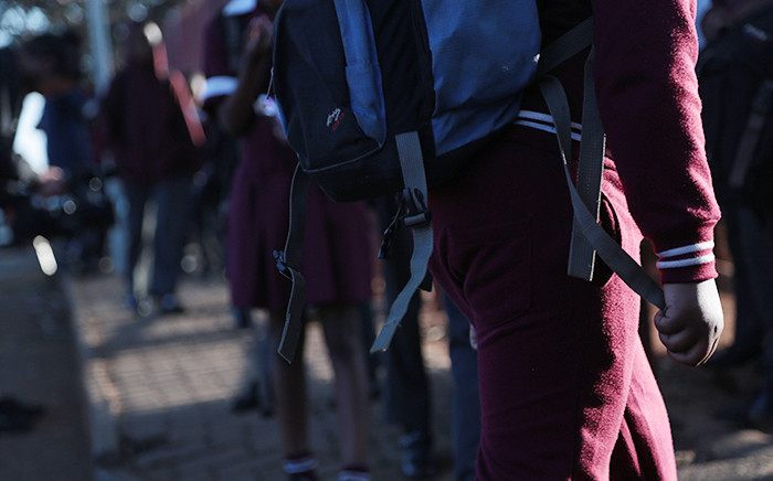FILE. Pupils arrive for the first day back at Roodepoort Primary after the school was reopened following its closure over staff appointments. Picture: Reinart Toerien/EWN