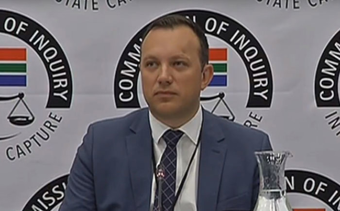 A screengrab of journalist Adriaan Basson appearing at the Zondo Commission on 5 February 2019.