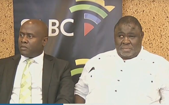 A screengrab of SABC acting CEO James Aguma and SABC board chairperson Mbulaheni Maguvhe at a press briefing.