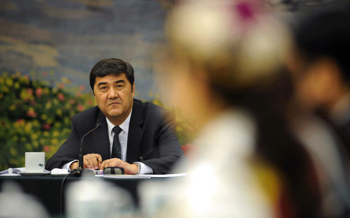 Chairman and Vice Secretary of the Party Committee of Xinjiang Uygur Autonomous Region, Nur Bekri attends the Xinjiang Uygur Autonomous Region open session as part of the National People's Congress (NPC) events in Beijing on 7 March 2013. Picture: AFP.