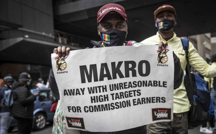 Striking Massmart employees affiliated to Saccawu march to a Game store in the Joburg CBD on 26 November 2021. Picture: Abigail Javier/Eyewitness News
