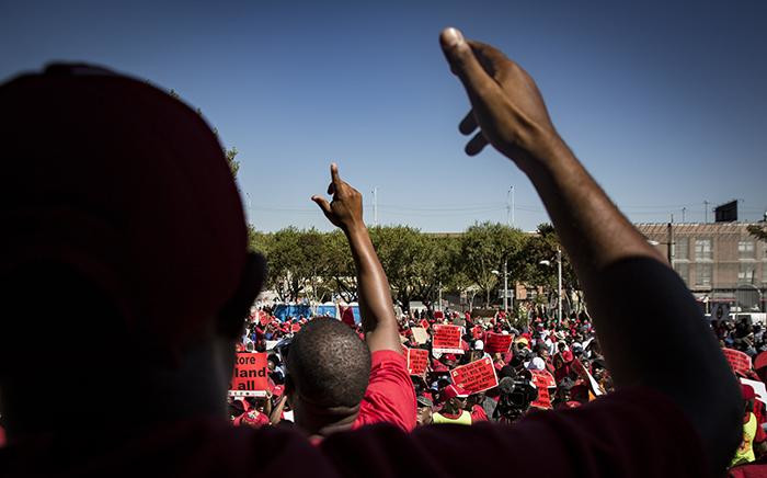 Saftu Member singing and dancing before the march commenced at the Mary Fitzgerald Square in NewTown, Johannesburg 25 April 2018. Picture: Sethembiso Zulu/EWN 