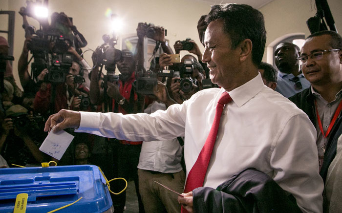 Madagascar presidential candidate Marc Ravalomanana casts his ballot at the polling station in Faravohitra district during the 2nd round of the presidential election, in Antananarivo, on 19 December 2018. Picture: AFP