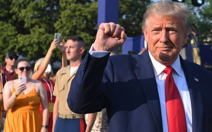 US President Donald Trump pumps his fist as he arrives for the 2020 "Salute to America" event in honour of Independence Day on the South Lawn of the White House in Washington, DC, 4 July 2020. Picture:AFP