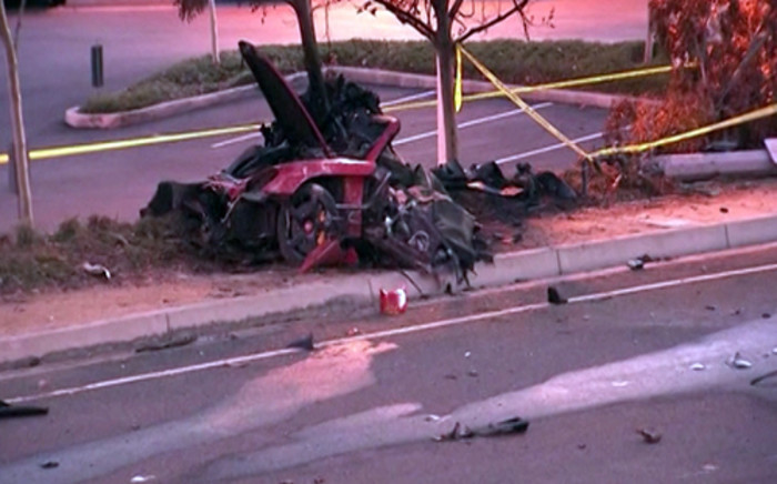 A screen grab from a CNN report showing the wreckage of the fatal accident involving Actor Paul Walker. Picture: CNN