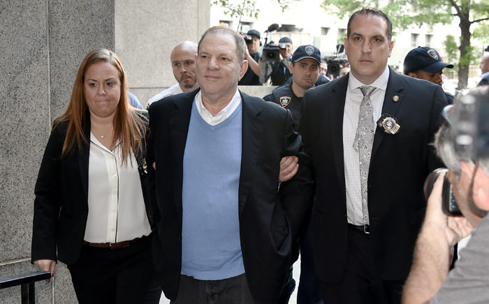 FILE: Harvey Weinstein arrives for arraignment at Manhattan Criminal Courthouse in handcuffs after being arrested and processed on charges of rape, committing a criminal sex act, sexual abuse and sexual misconduct on 25 May 2018 in New York City. Picture: AFP