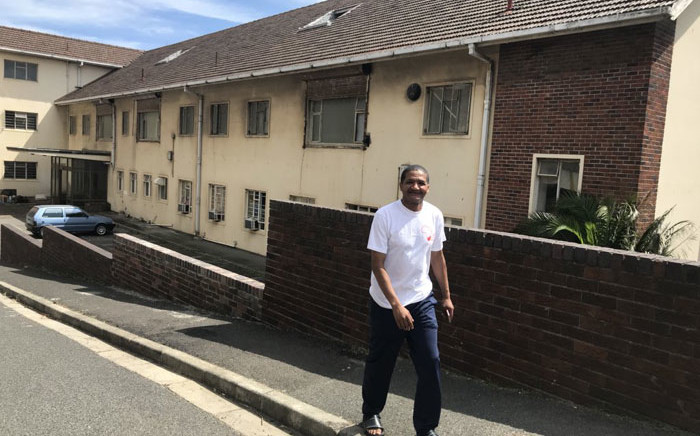 Housing activist Denver Arendse at the old Woodstock Hospital in Cape Town. Picture: Monique Mortlock/EWN