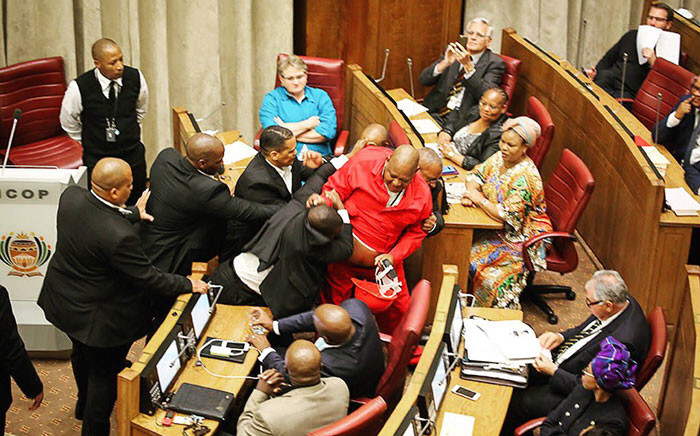 EFF members have be removed from the National Council of Provinces by the parliamentary protection services. Picture: Anthony Molyneaux/EWN.