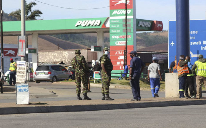 FILE: eSwatini soldiers and police. Picture: AFP