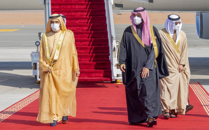 A handout picture provided by the Saudi Royal Palace on 5 January 2021, shows Crown Prince Mohammed bin Salman (R) welcoming Dubai's ruler and UAE Vice President Sheikh Mohammed bin Rashid Al-Maktoum upon his arrival in the city of al-Ula in northwestern Saudi Arabia for the 41st Gulf Cooperation Council summit. Picture: AFP