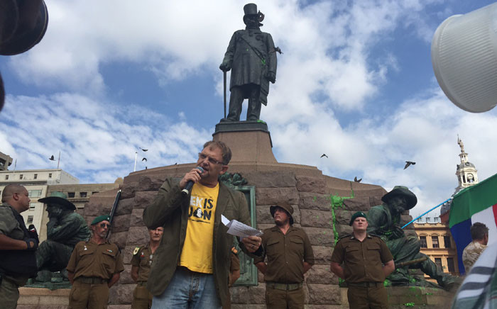 Afrikaans singer Steve Hofmeyer singing 'Die Stem' next to the Paul Kruger statue in Pretoria on 8 April 2015. Picture: Reinart Toerein/EWN.