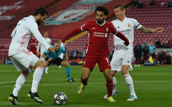 Liverpool's Mohamed Salah (centre) attempts to get past Real Madrid's Toni Kroos and Casemiro in their Uefa Chmapions League match at Anfield in Liverpool, England on 14 April 2021. Picture: @LFC/Twitter