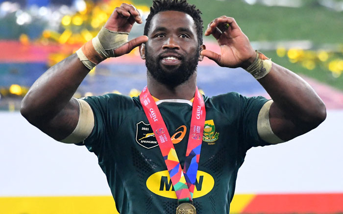 South Africa captain Siya Kolisi celebrates after victory in the third rugby union Test match between South Africa and the British and Irish Lions at the Cape Town Stadium in Cape Town on 7 August 2021. Picture: Rodger Bosch/AFP