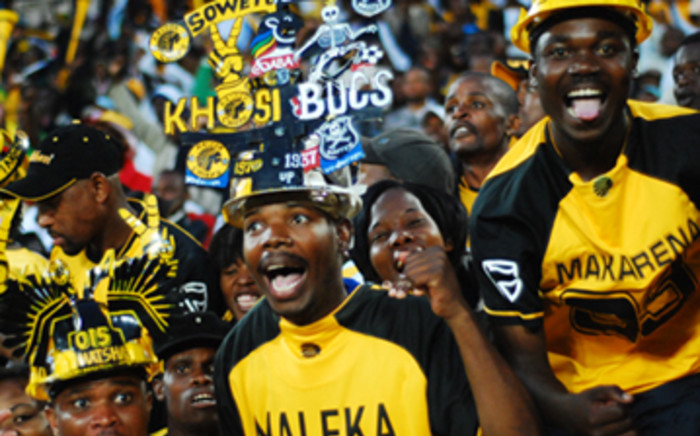 "Kaizer Chiefs supporters celebrate a goal at Coca-Cola Park. Orlando Pirates won 2-1. Picture: Taurai Maduna/Eyewitness News