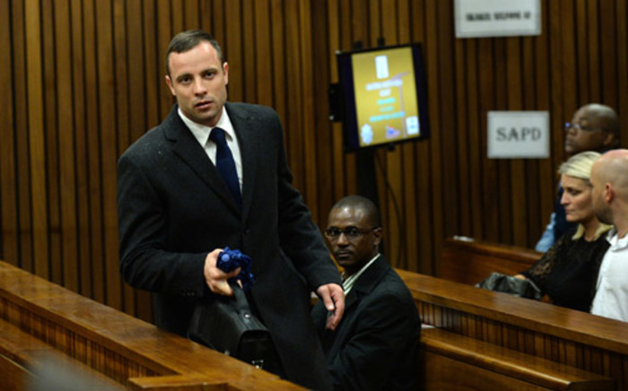 Oscar Pistorius on the second day of his murder trial on 4 March 2014 at the North Gauteng High Court in Pretoria. Picture: Pool.