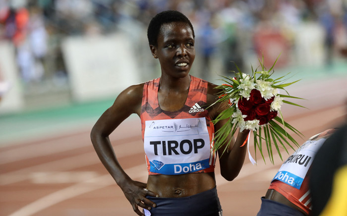 FILE: Agnes Jebet Tirop of Kenya celebrates after winning second-place in the women's 3,000 metres race during the Diamond League athletics competition at the Suhaim bin Hamad Stadium in Doha, on 4 May 2018. Picture: KARIM JAAFAR/AFP