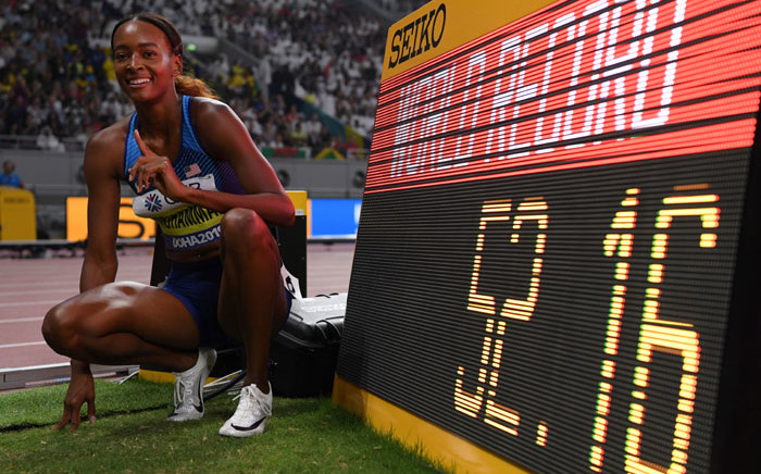 USA's Dalilah Muhammad celebrates after winning the Women's 400m Hurdles final in a new world record time at the 2019 IAAF Athletics World Championships at the Khalifa International Stadium in Doha on 4 October 2019. Picture: AFP
