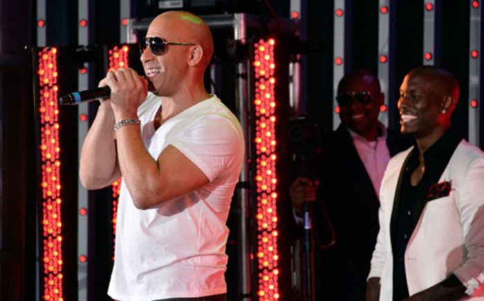 FILE: Actors Vin Diesel and Tyrese Gibson on stage at the Premiere Of Universal Pictures' "Fast & Furious 6" on May 21, 2013 in Universal City, California. Frazer Harrison/Getty Images/AFP.
