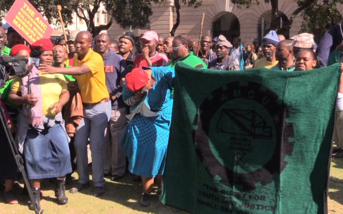 Marikana miners singing outside high court in pretoria on Monday 15 June. Picture; Kgothatso Mogale/EWN